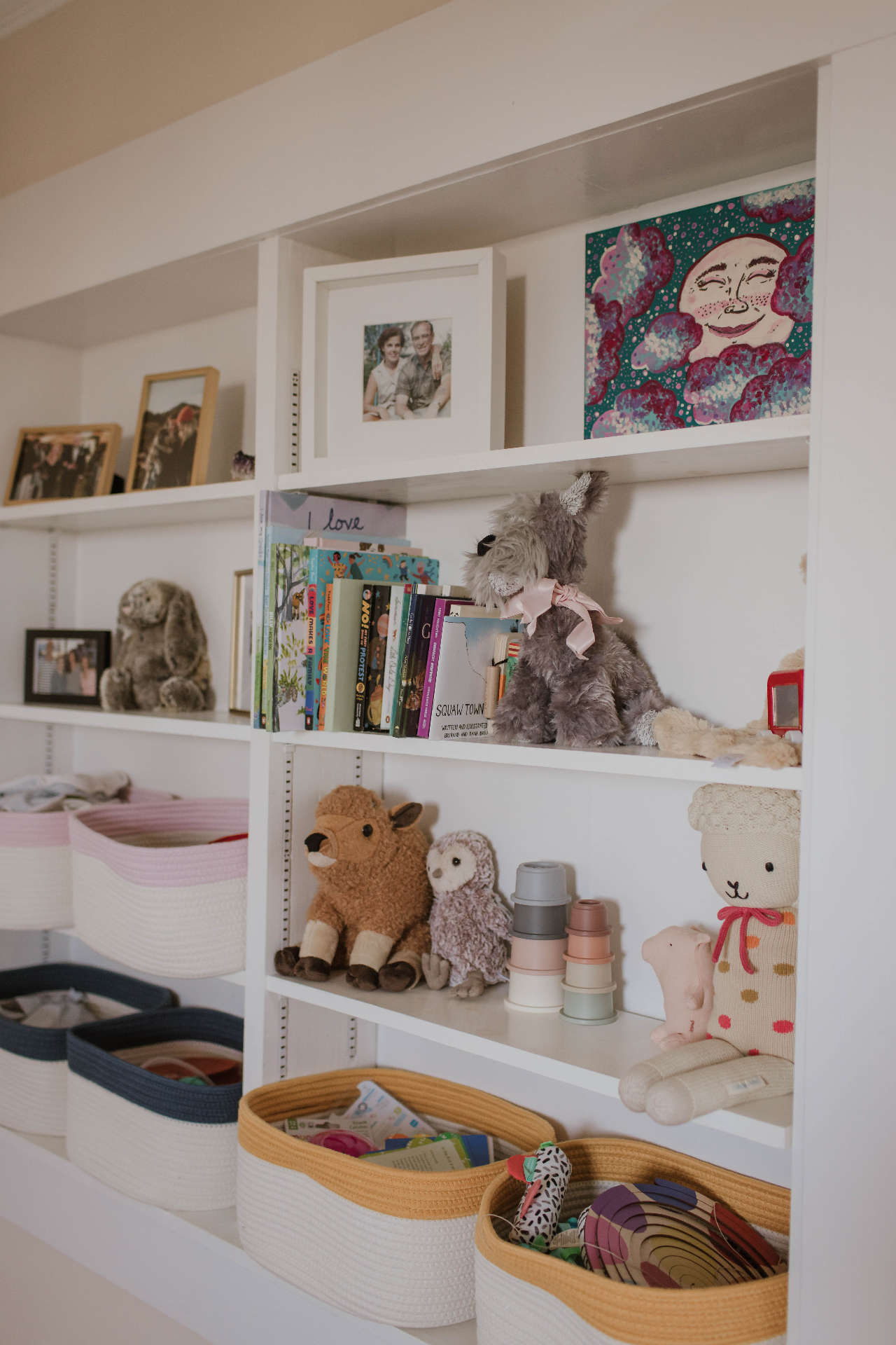 Nursery shelf with organized baby care products